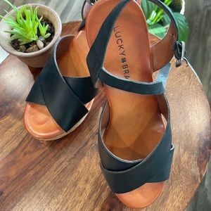 Lucky Brand black cork wedge heels.